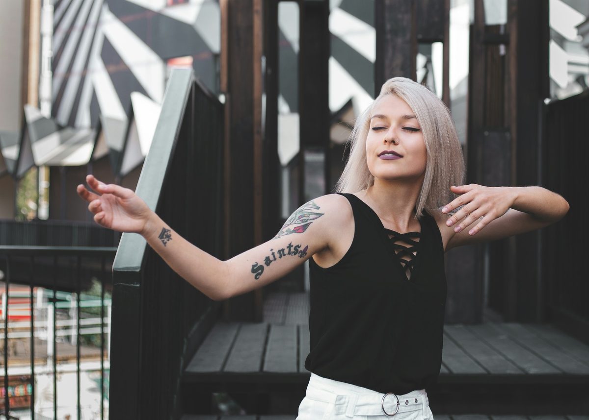 Person showing off their tattoos