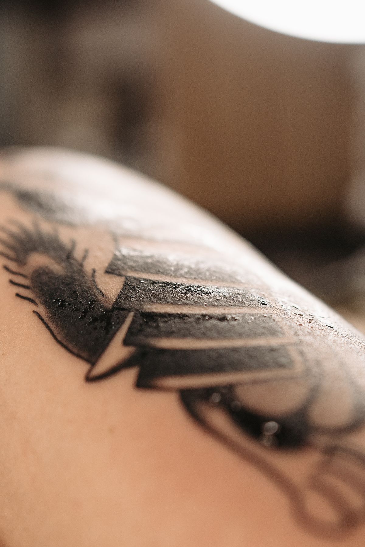 Close-up of a new tattoo showing skin texture during healing