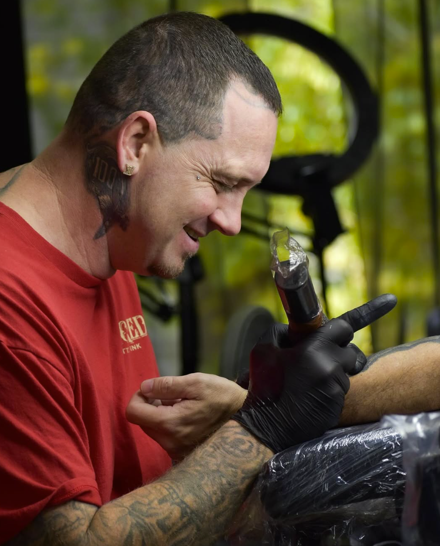 Daniel Greene tattooing at Black Bumble Tattoo