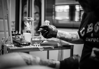 Tattoo artist at work